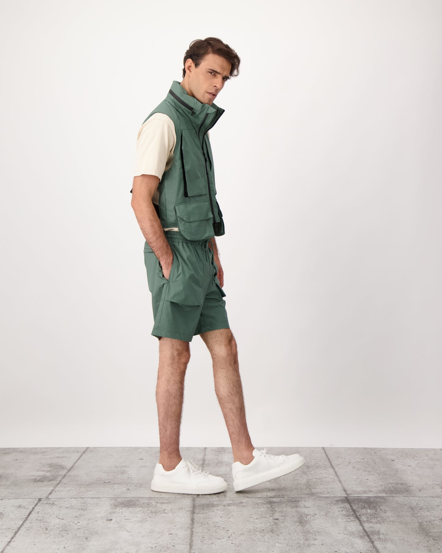 Tiber is a men’s lightweight waterproof short in Duck Green