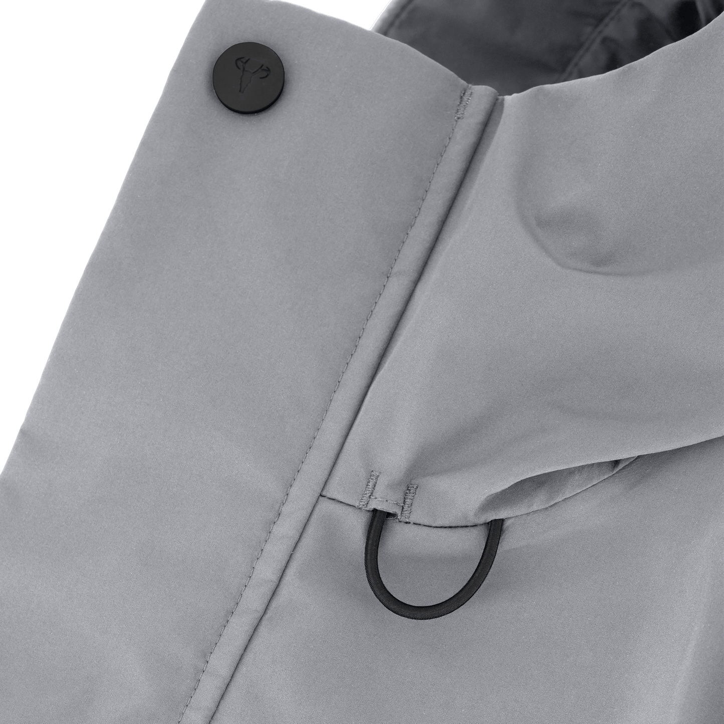 Upton long jacket in Concrete in 3-ply Micro Denier fabric with DWR coating, featuring a two-way zipper with magnetic closure, hidden mesh ventilation, and underarm vents. Designed for weather protection and tailored comfort.