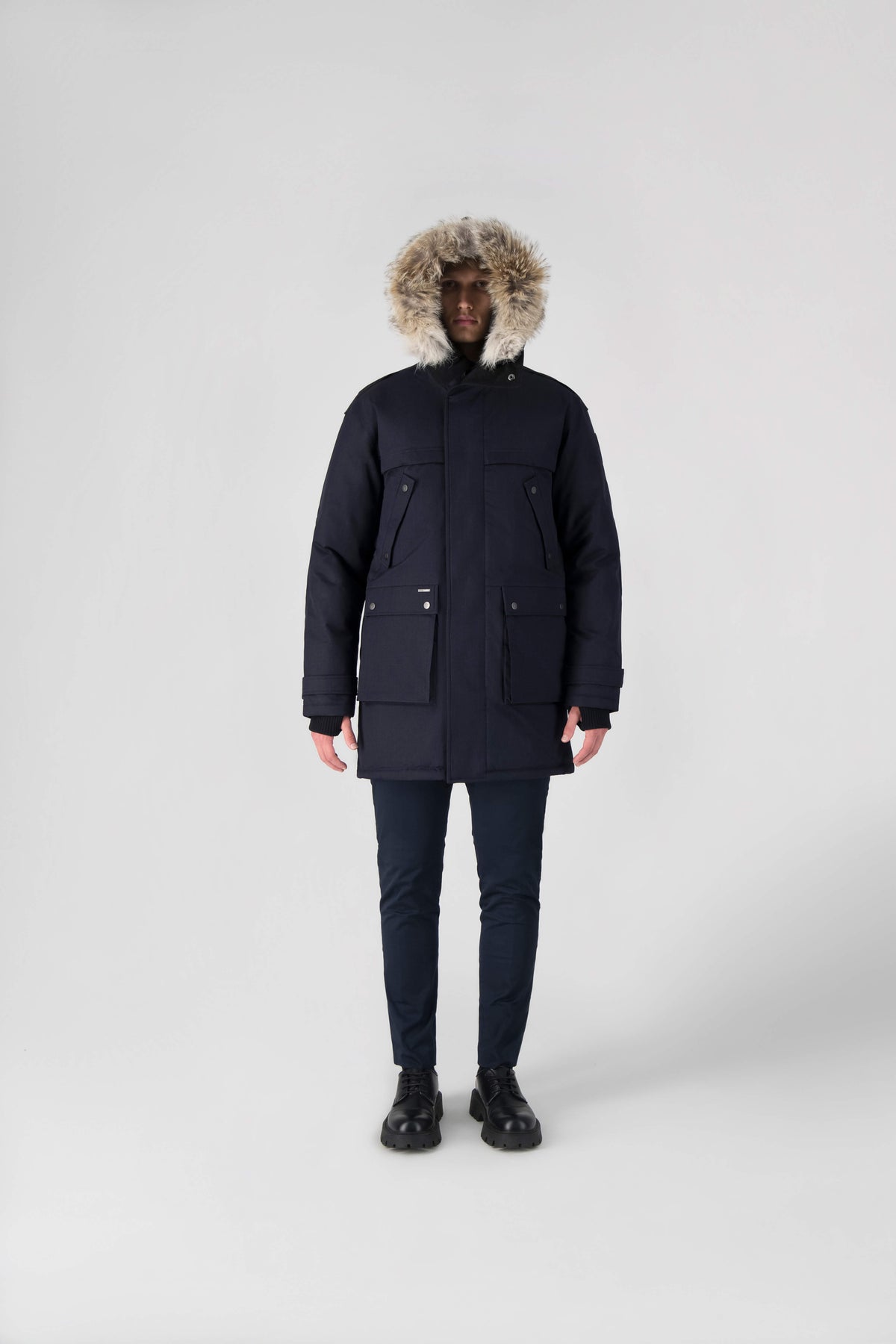 Men's Best Selling Parka the Yatesy is a down filled jacket with a zipper closure and magnetic placket in Navy