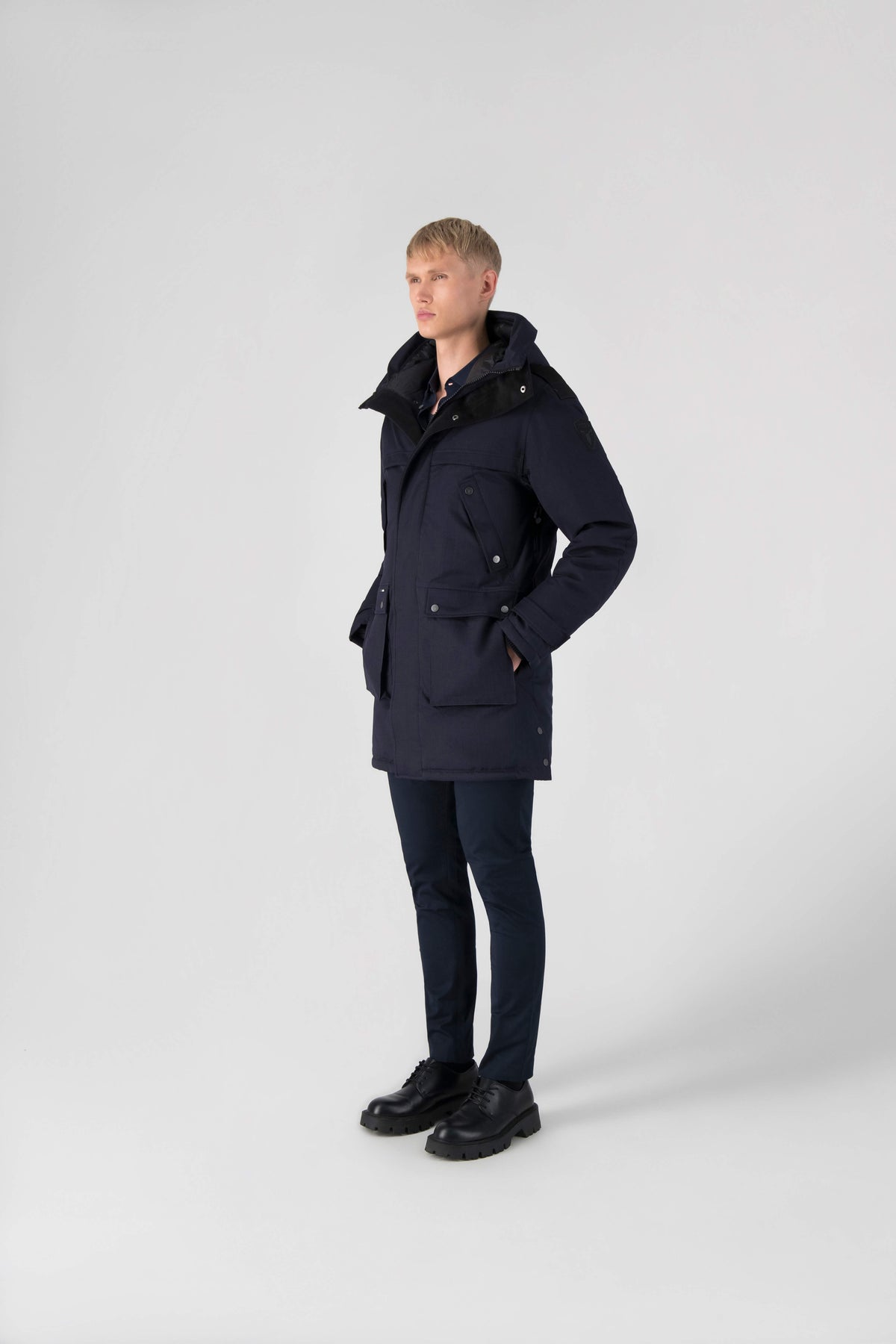 Men's Best Selling Parka the Yatesy is a down filled jacket with a zipper closure and magnetic placket in Navy