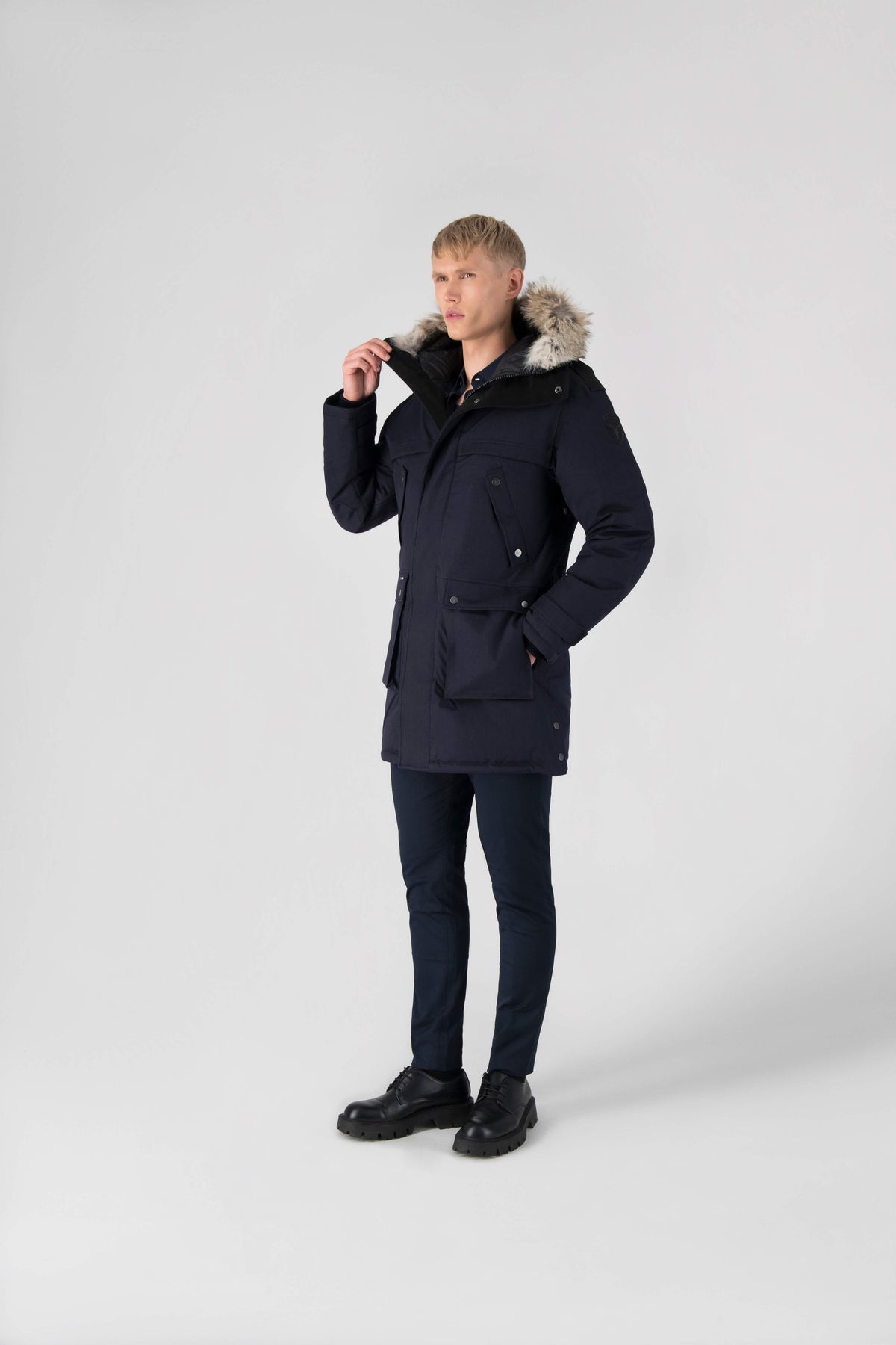 Men's Best Selling Parka the Yatesy is a down filled jacket with a zipper closure and magnetic placket in Navy