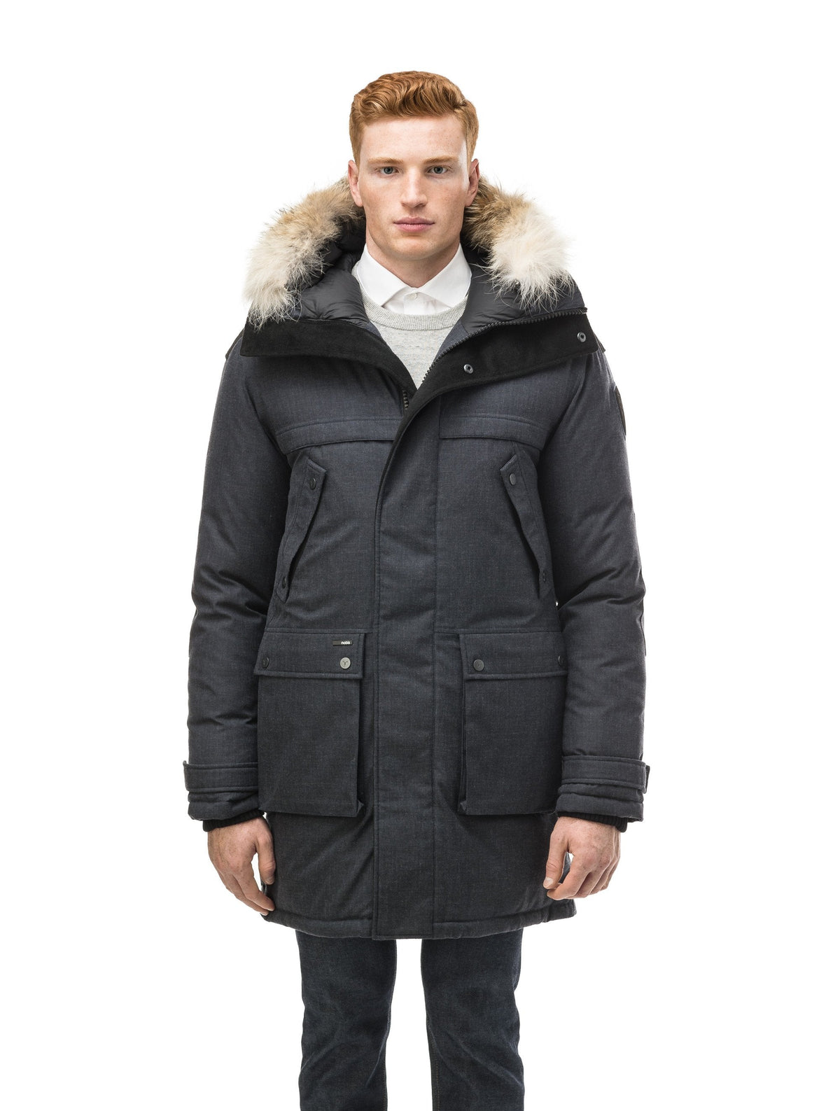 Men's Best Selling Parka the Yatesy is a down filled jacket with a zipper closure and magnetic placket in Heather Navy
