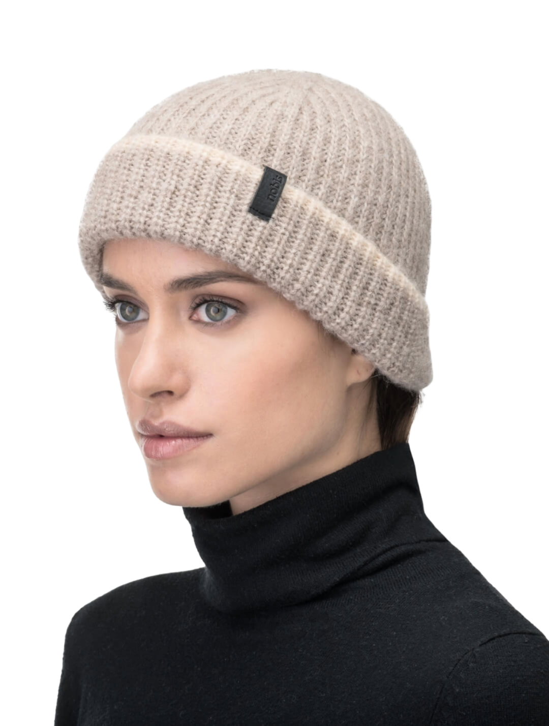 Dres Unisex 6-Dart Toque beanie in superfine alpaca and merino wool, contrast colour knit along cuff, and Nobis embossed leather label at the cuff, in Wheat