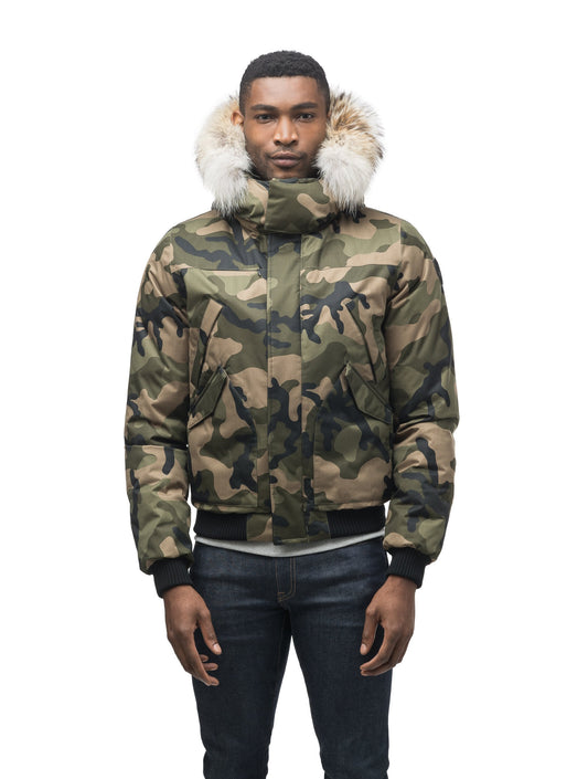 Men's classic down filled bomber jacket with a down filledÃƒÆ’Ã¢â‚¬Å¡Ãƒâ€šÃ‚Â hood that features a removable coyote fur trim and concealed moldable framing wire in Camo