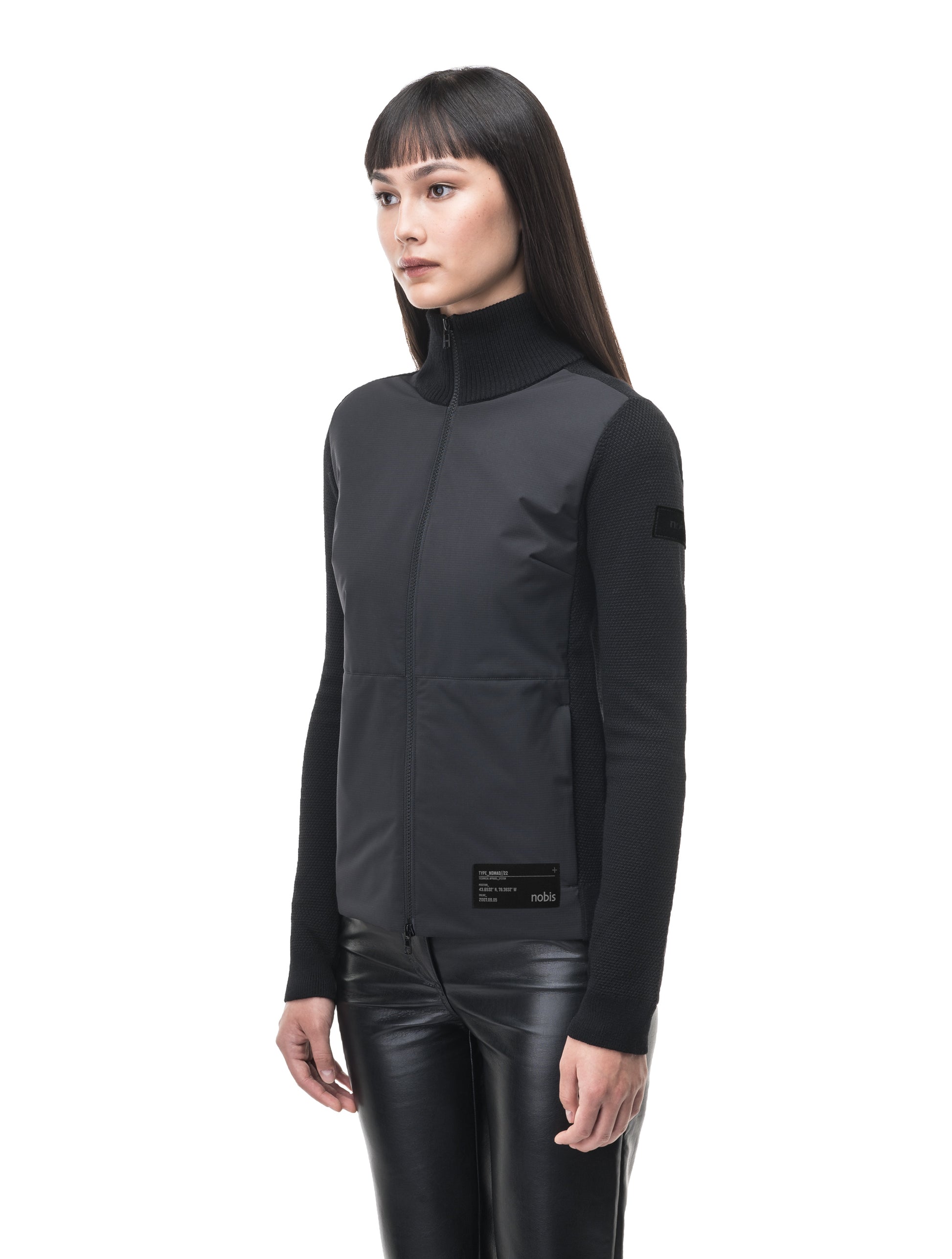 Evo Ladies Performance Full Zip Sweater in hip length, Primaloft Gold Insulation Active+, Merion wool knit collar, sleeves, back, and cuffs, two-way front zipper, and hidden waist pockets, in Black