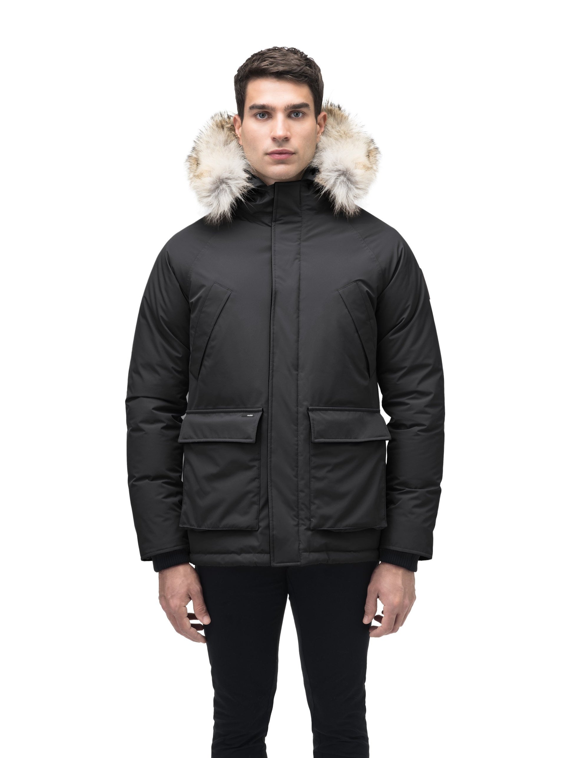 Men's waist length down filled jacket with two front pockets with magnetic closure and a removable fur trim on the hood in Cy Black