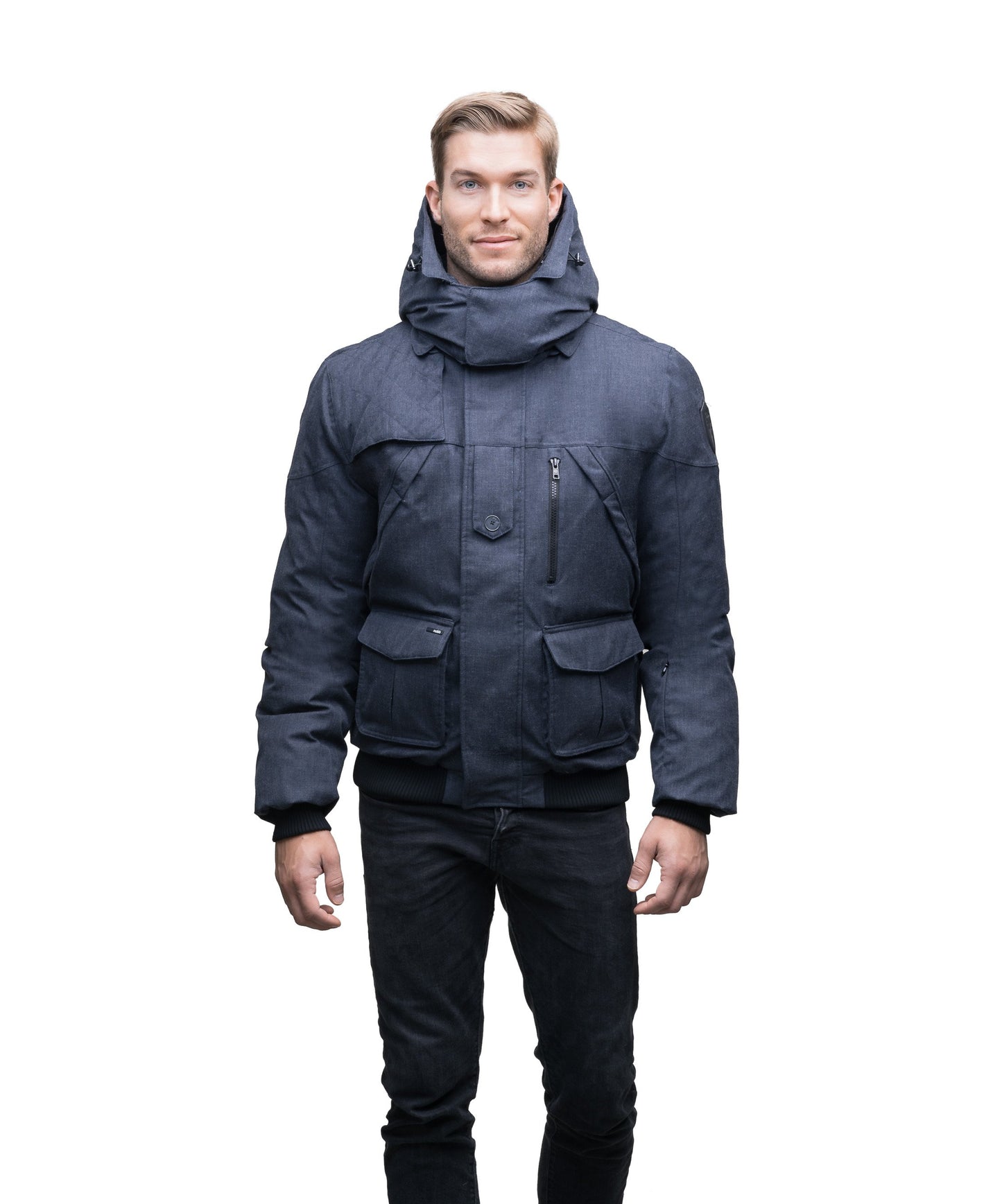 Men's classic down bomber with two patch pockets and a right shoulder storm flap in H. Navy