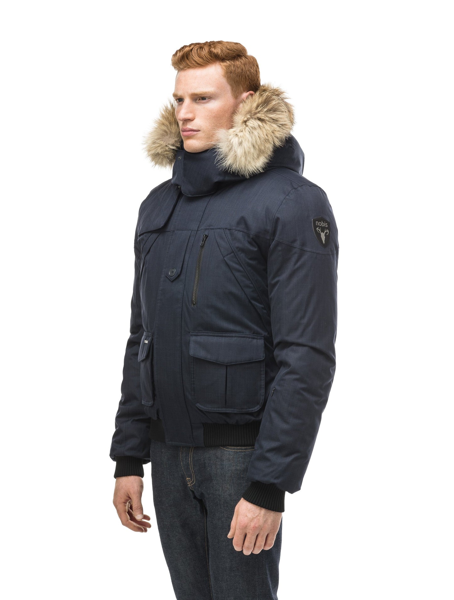 Men's classic down bomber with two patch pockets and a right shoulder storm flap in CH Navy