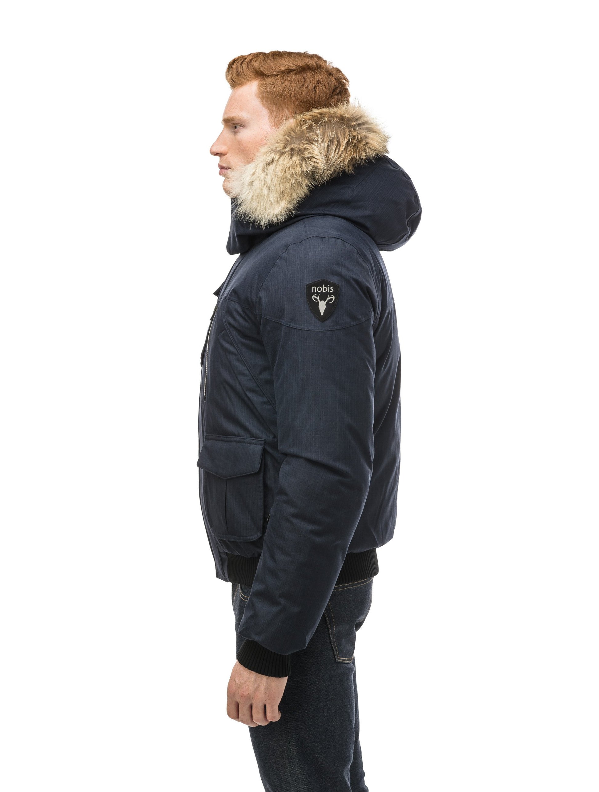 Men's classic down bomber with two patch pockets and a right shoulder storm flap in CH Navy