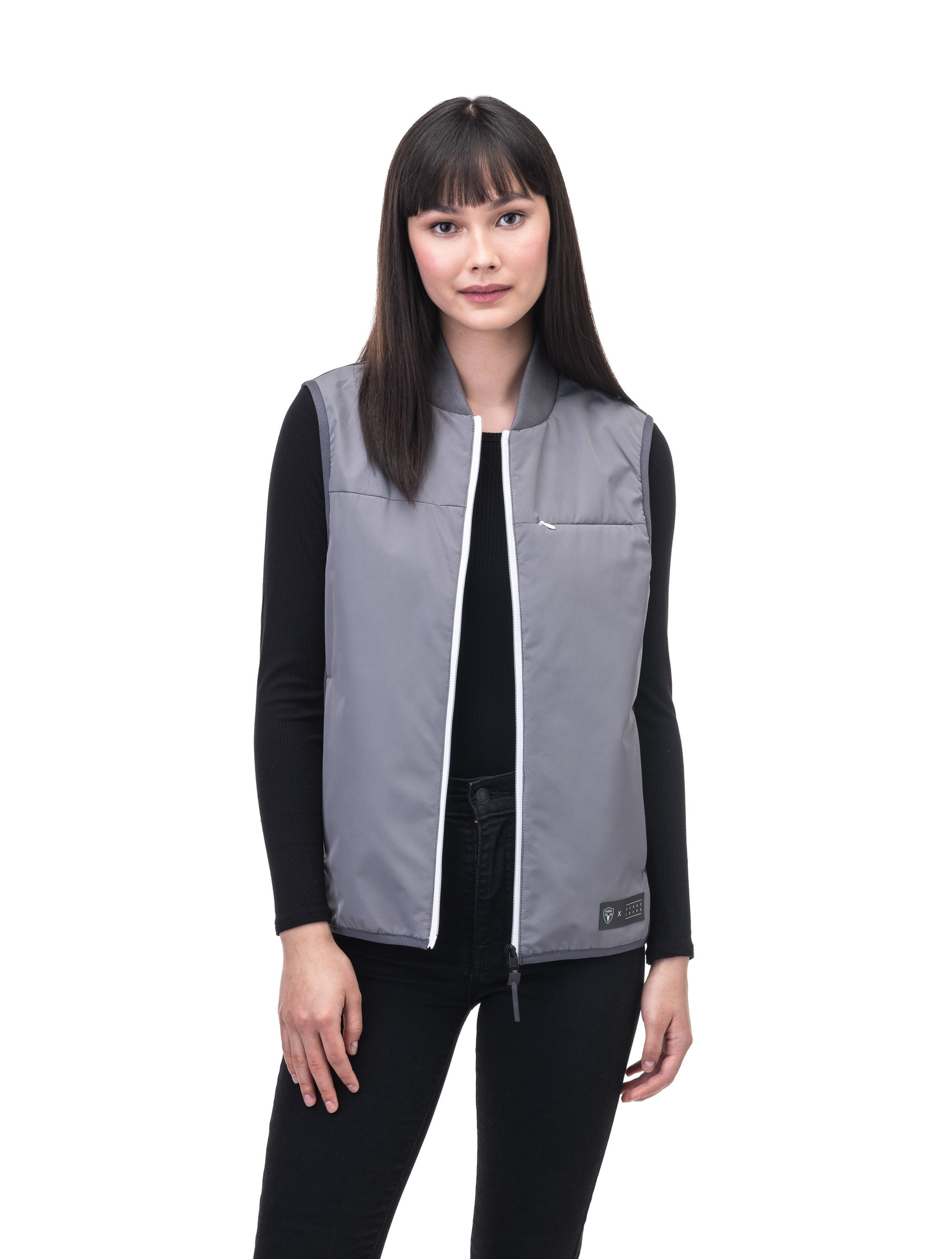 Unisex hip length vest with a contrast colour back panel, and hidden zipper pockets at waist, and an invisible zipper pocket at chest, in Concrete/Steel Grey