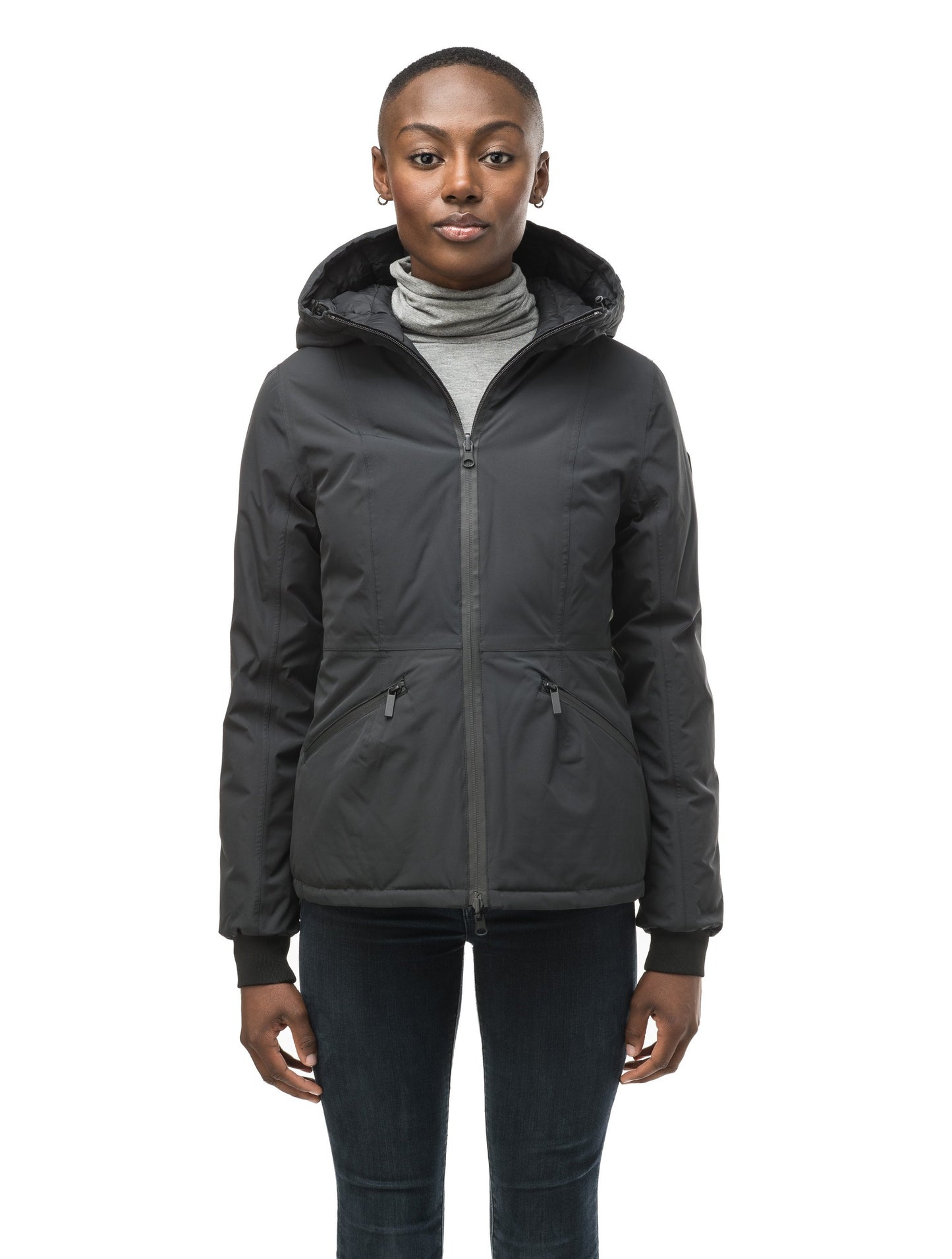 A women's two in one reversible hip length down jacket, one side is quilted and one side is solid waterproof fabric in Black