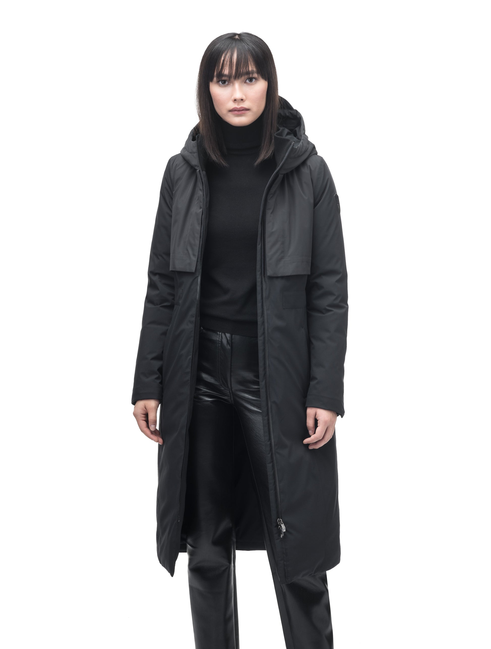 Iris Ladies Long Parka in below the knee length, Canadian duck down insulation, non-removable hood, and two-way zipper, in Black