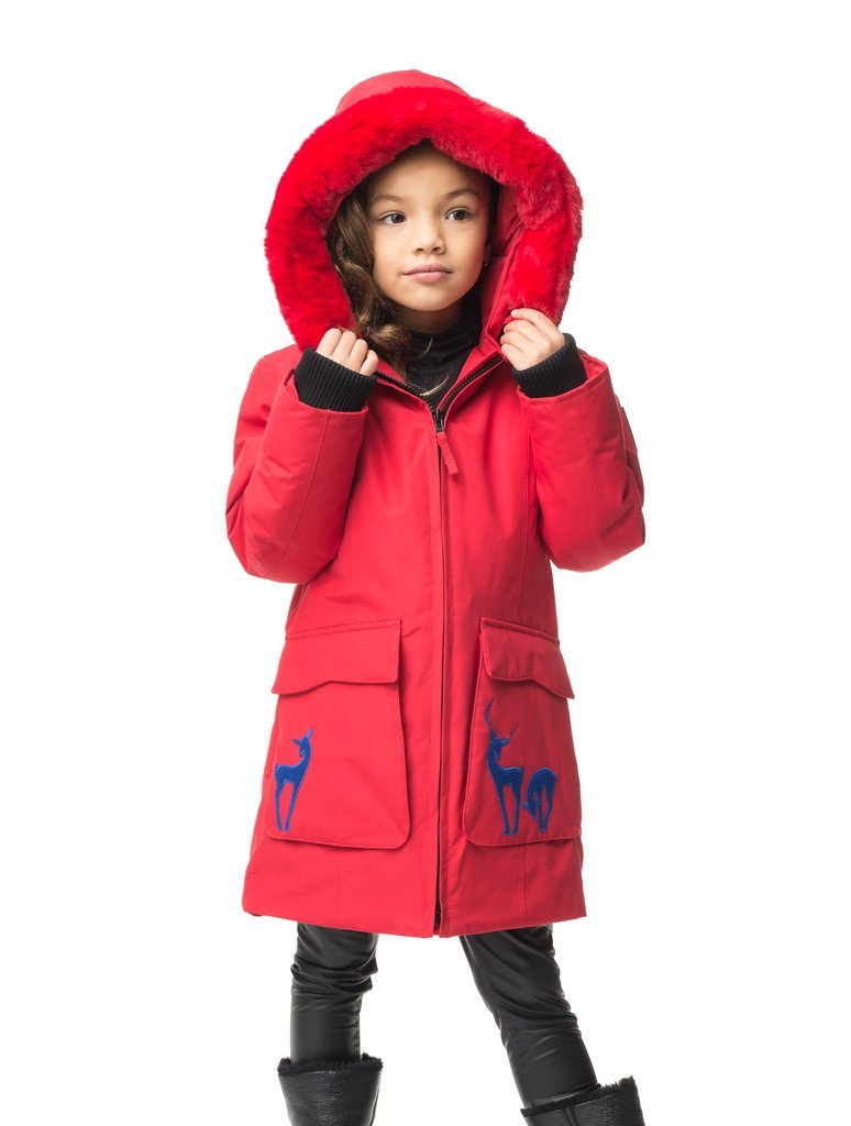 Kid's knee length down filled parka with deer applique detailing on the front patch pockets in Cy Red