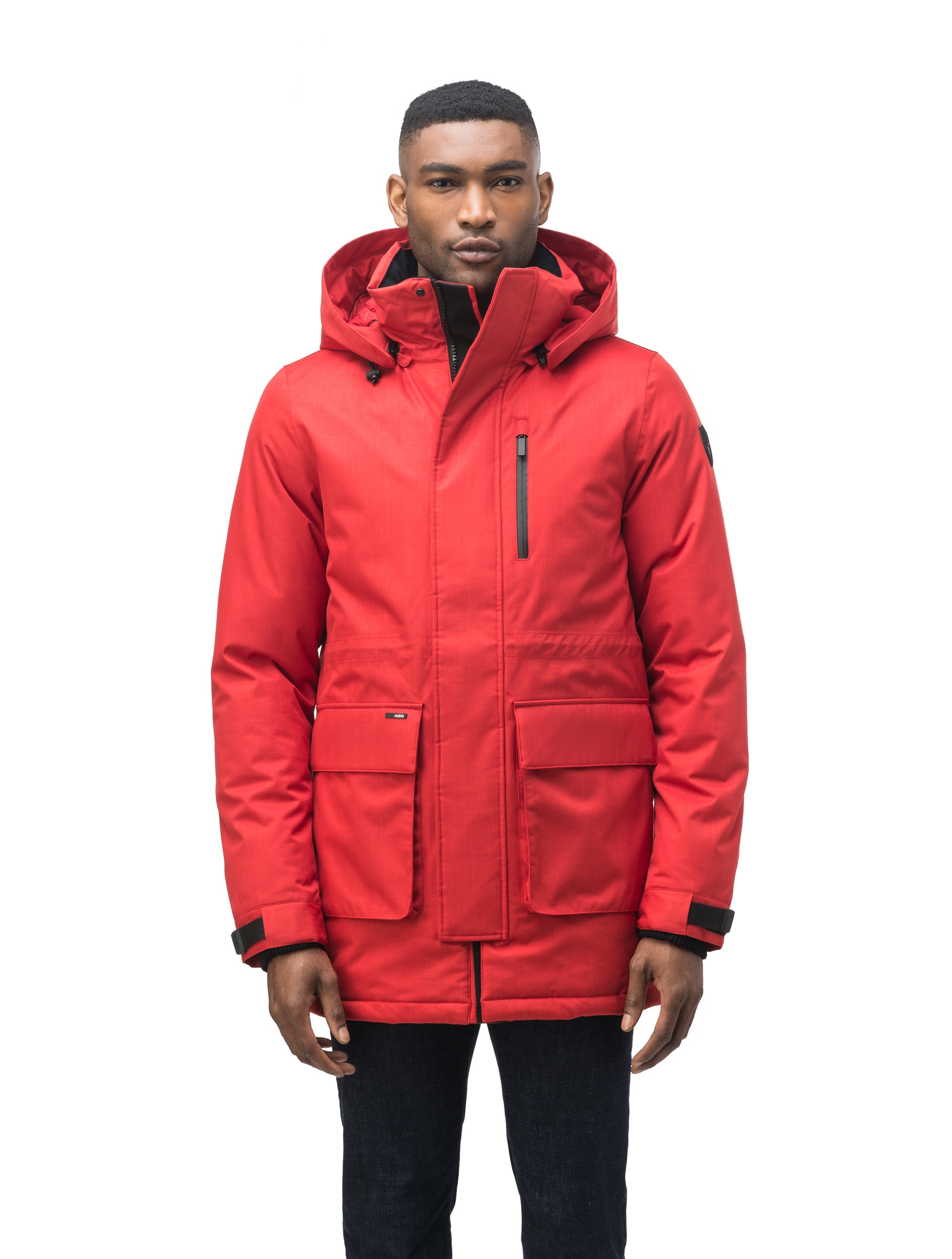 Mid weight men's down filled parka with two patch pockets at the hip and snap closure side vents in Vermillion