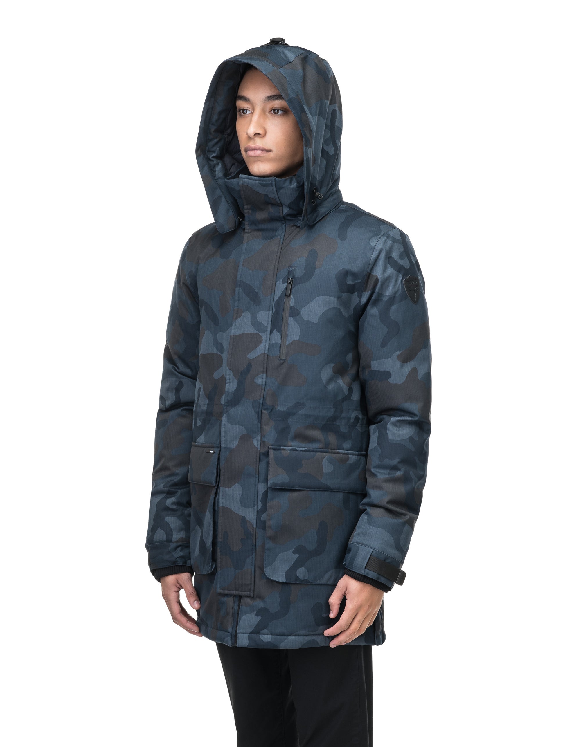Mid weight men's down filled parka with two patch pockets at the hip and snap closure side vents in Navy Camo