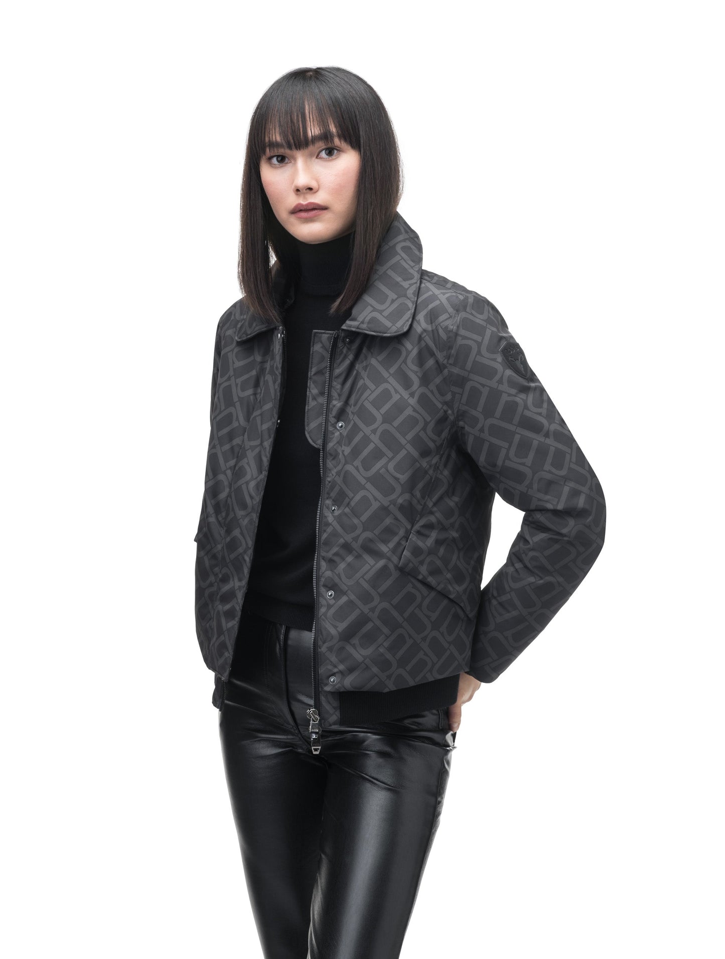 Rae Ladies Aviator Jacket in hip length, Canadian duck down insulation, removable shearling collar with hidden tuckable hood, and two-way front zipper, in Dark Monogram