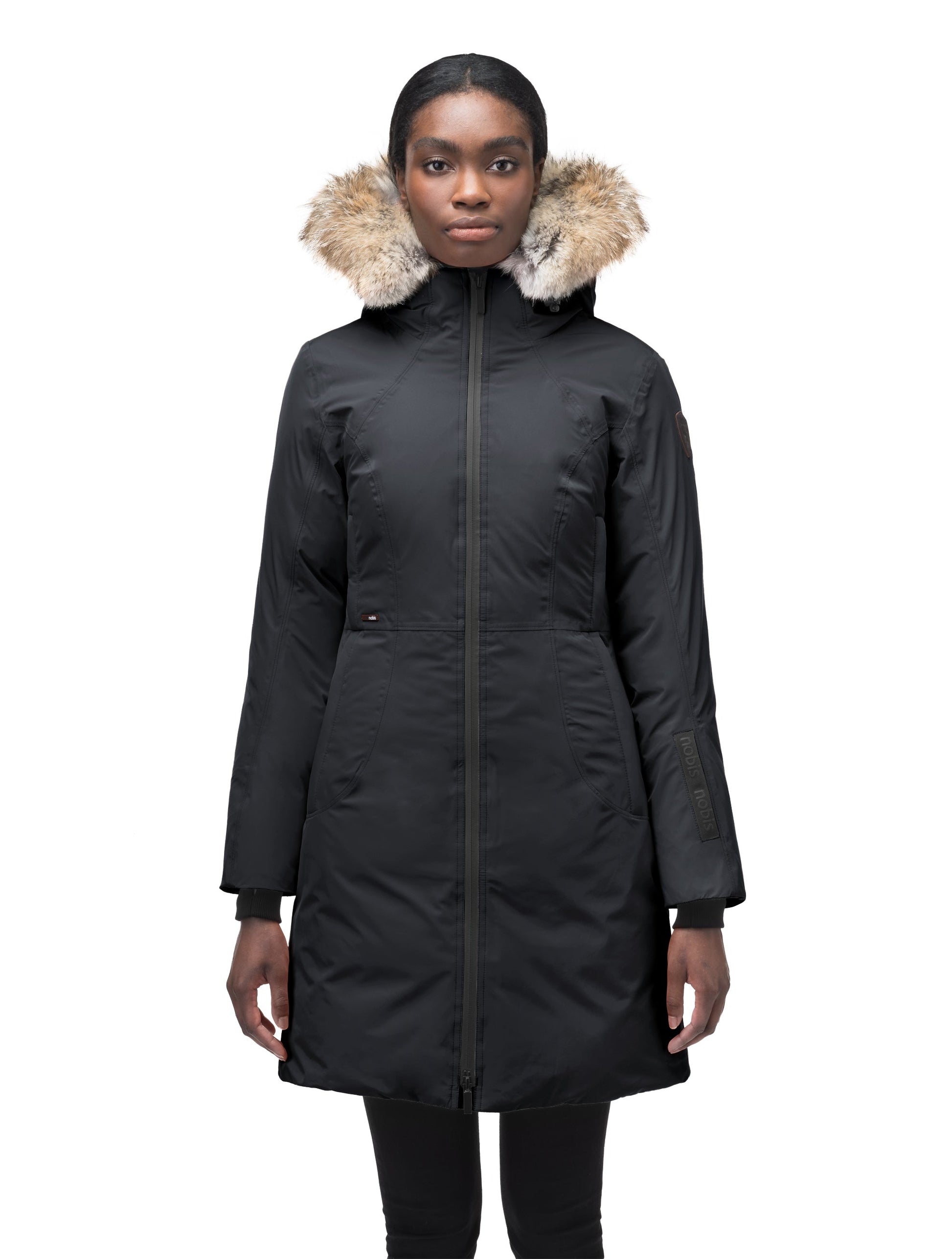 Ladies thigh length down-filled parka with non-removable hood and removable coyote fur trim in Black