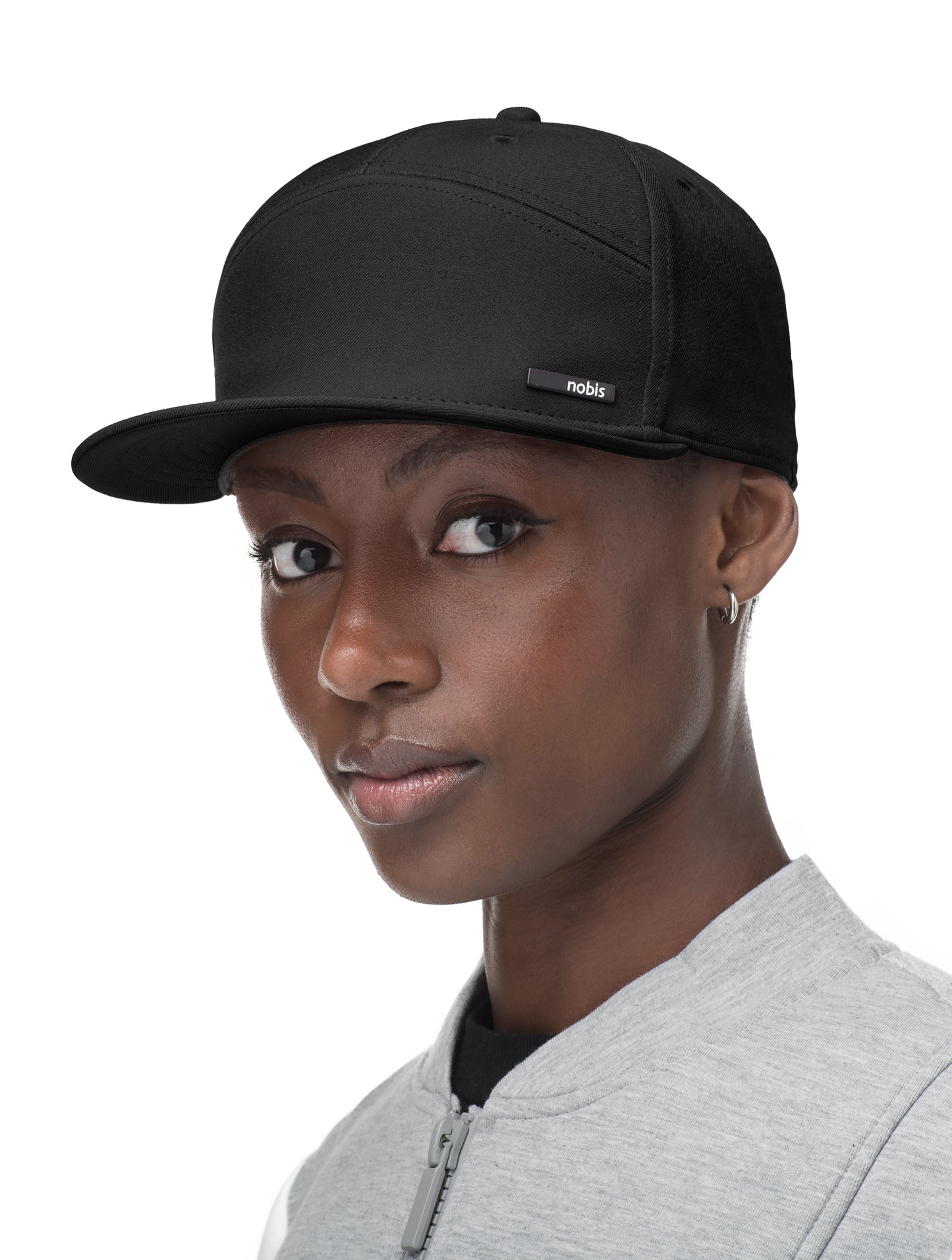 Unisex 7-panel snapback hat with flat brim and structured crown in Black