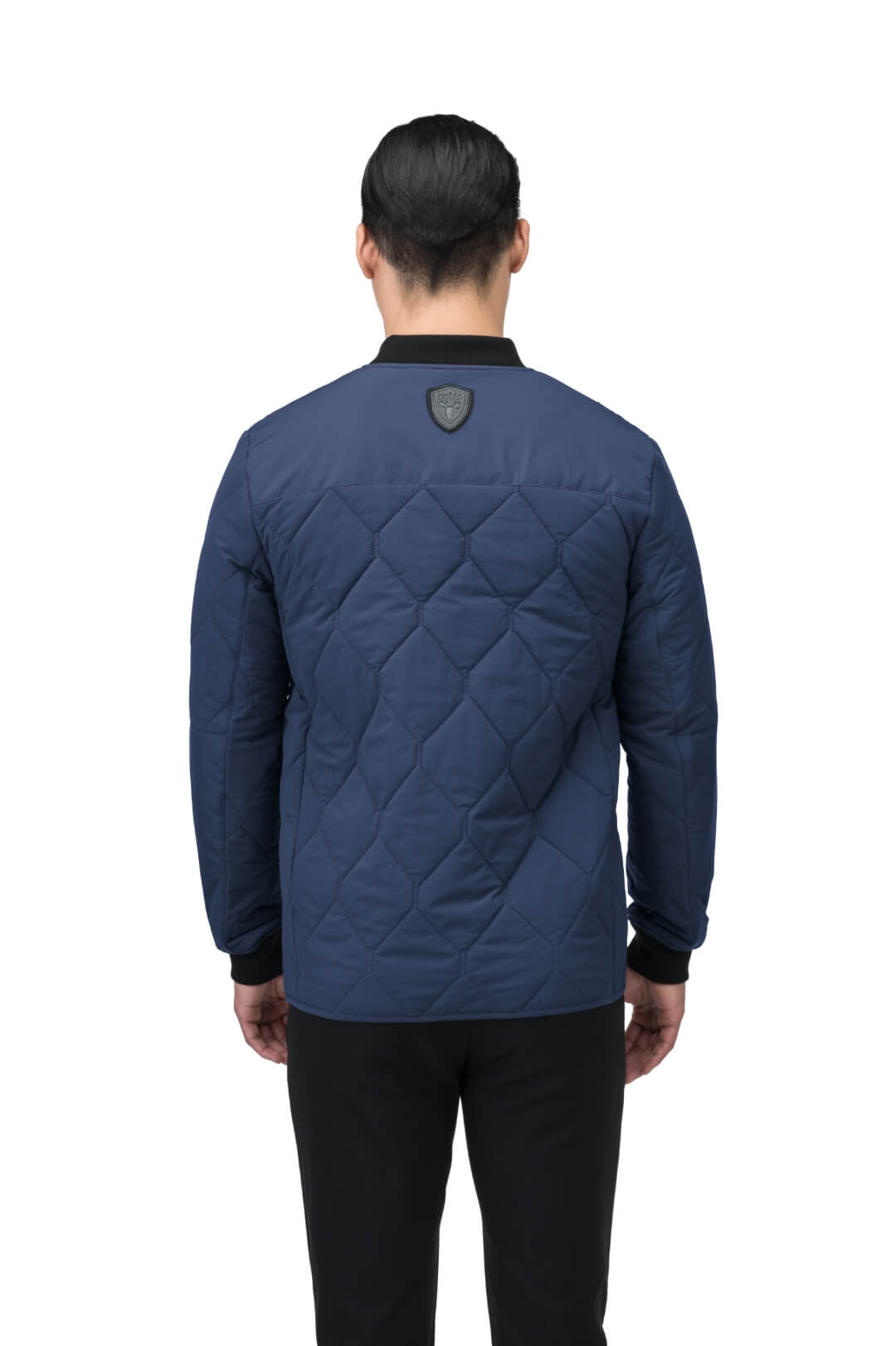 Speck Men's Tailored Mid Layer Jacket in hip length, Primaloft Gold Insulation Active+, diamond quilted body, rib knit collar and cuffs, snap buton front closure, and hidden side-entry zipper pockets at waist, in Blueprint