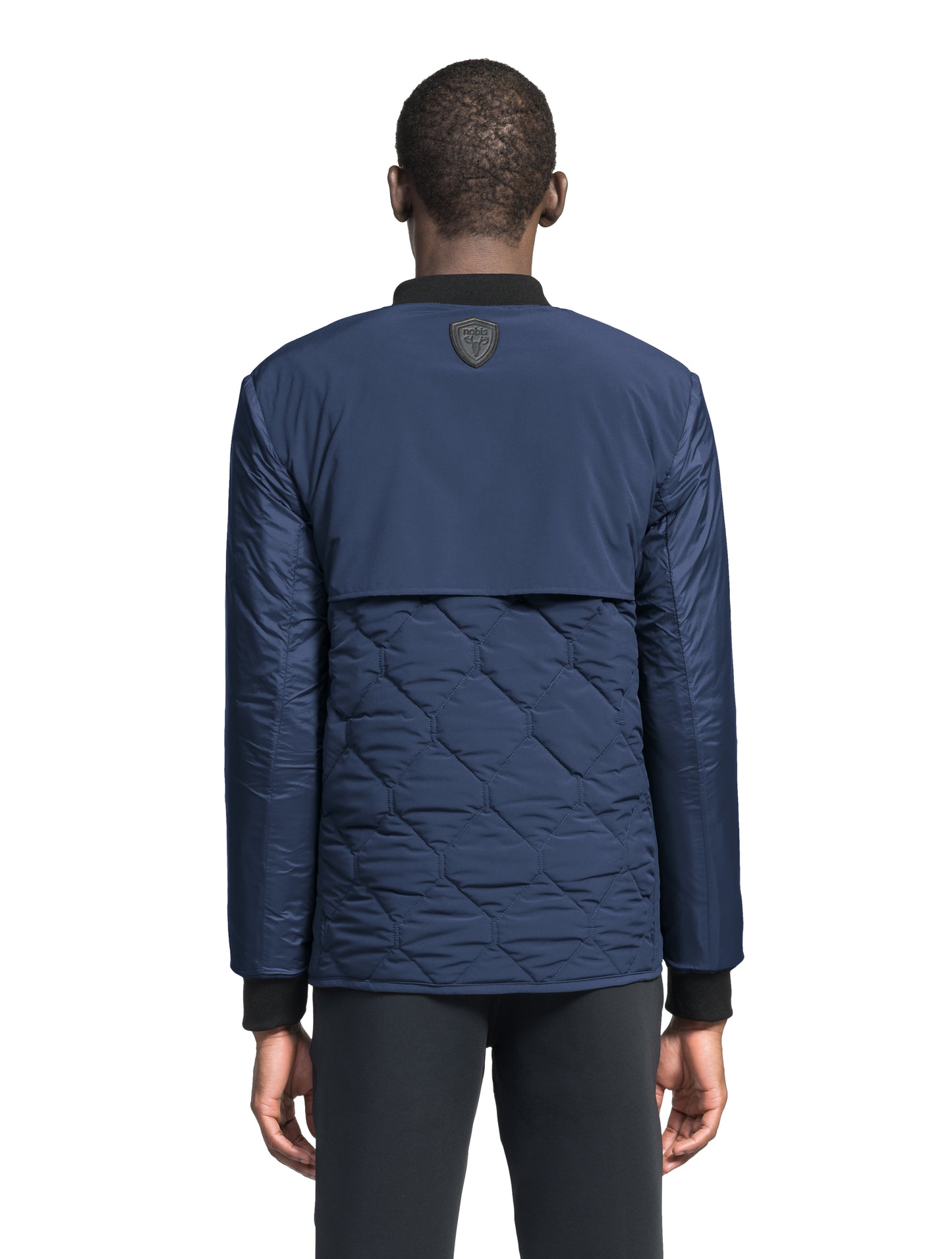 Speck Men's Tailored Mid Layer Jacket in hip length, Primaloft Gold Insulation Active+, diamond quilted body, rib knit collar and cuffs, snap buton front closure, and hidden side-entry zipper pockets at waist, in Blueprint