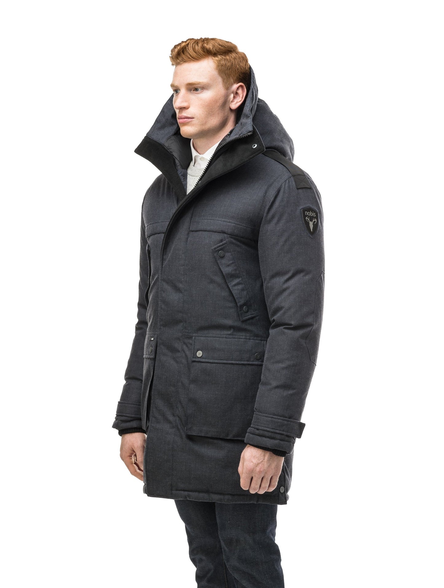 Men's Best Selling Parka the Yatesy is a down filled jacket with a zipper closure and magnetic placket in H. Navy
