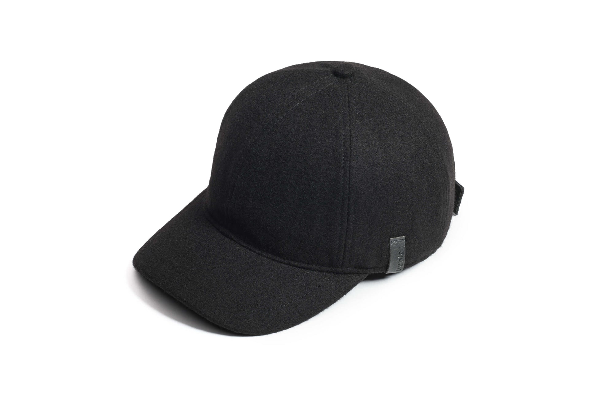Bronte Unisex Field Cap with low structured crown, curved peak brim, and adjustable webbing strap closure, in Black